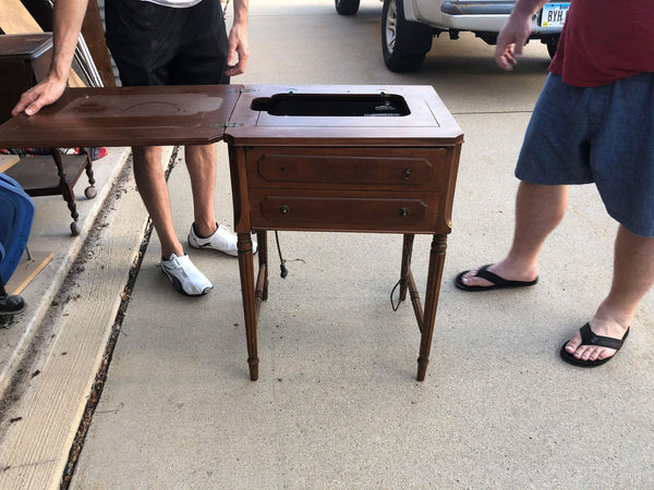 Antique Sewing Machine in side table