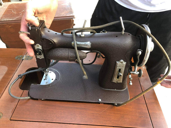 Antique Sewing Machine in side table